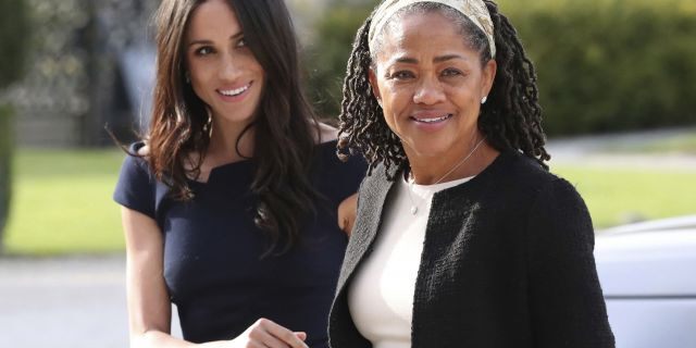 Meghan Markle, Duchess of Sussex, is seen with her mother, Doria Ragland, ahead of her royal wedding to Prince Harry last May. Ragland has said she is "overjoyed" at Duchess Meghan and Prince Harry's royal baby news but a source says she and her daughter aren't that close.