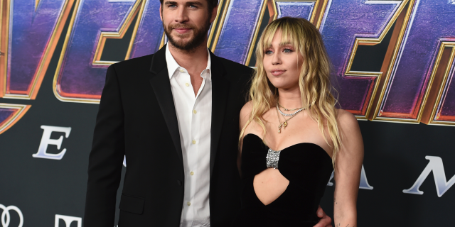 FILE - In this Monday, April 22, 2019, file photo, Liam Hemsworth and Miley Cyrus arrive at the premiere of "Avengers: Endgame" at the Los Angeles Convention Center.