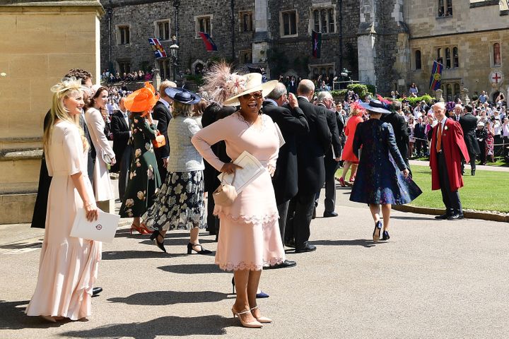 Oprah Winfrey leaves after attending the wedding ceremony of Prince Harry and Meghan Markle at St George's Chapel, at Windsor