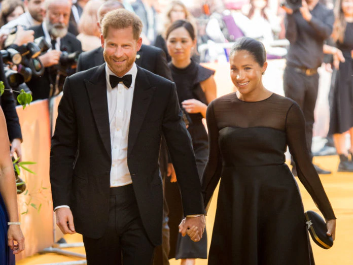 Prince Harry, Duke of Sussex and Meghan, Duchess of Sussex attend 