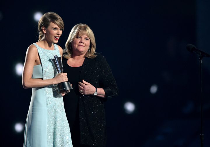 Taylor Swift and her mother, Andrea Swift, onstage during the 50th Academy of Country Music Awards in 2015.