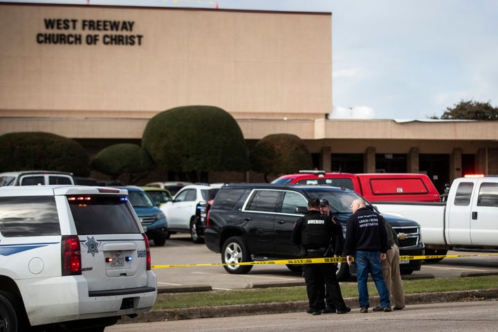 Police and fire department officials surround a scene of a shooting Sunday, Dec. 29, 2019, at West Freeway Church of Christ i