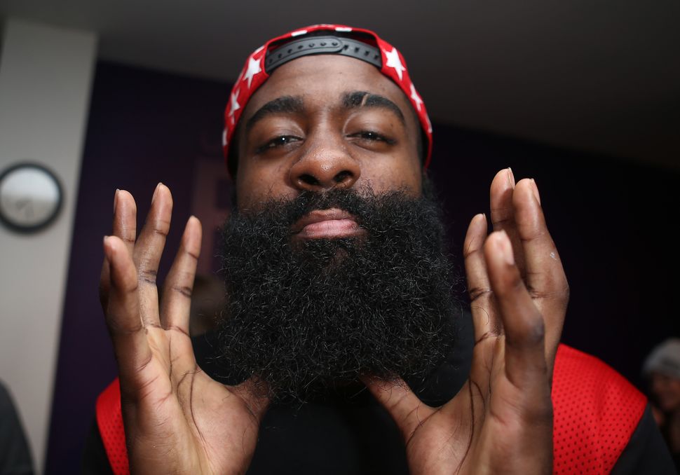 James Harden shows off his beard during a presentation by New Era Cap, which makes the caps for MLB, on Feb. 11, 2016, in Tor