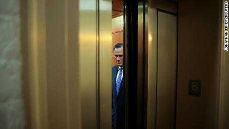 Mitt Romney (R-UT) rides in a U.S. Capitol elevator to cast a guilty vote during the Senate impeachment trial.