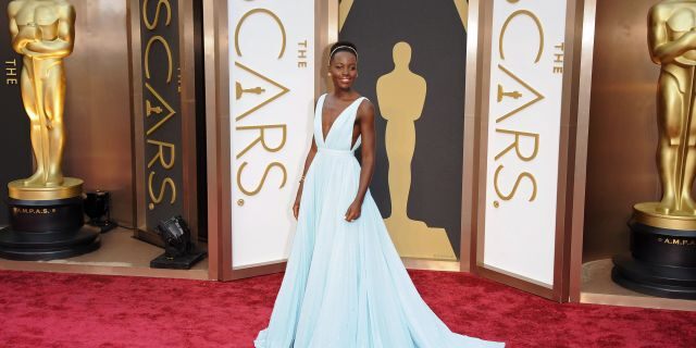 Lupita Nyong'o arrives at the 86th Annual Academy Awards at Hollywood &amp; Highland Center on March 2, 2014 in Hollywood, California. 