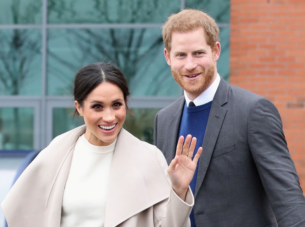 Harry and Meghan pictured after a visit to a science park called Catalyst Inc., in Belfast, Northern Ireland, on March 23, 20