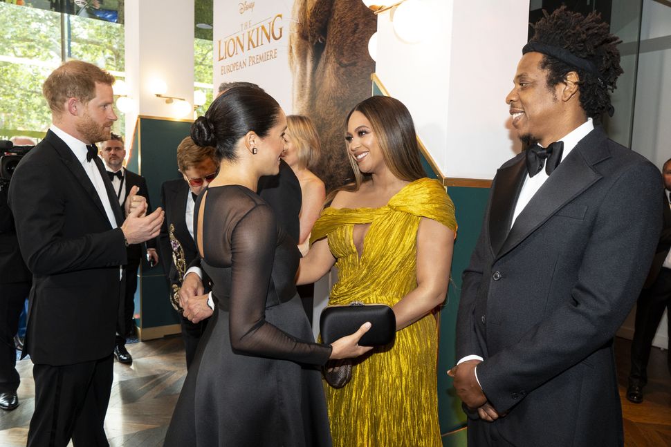 Meghan and Harry greet Beyonc&eacute; and Jay-Z as they attend the European premiere of Disney's "The Lion King" in London on