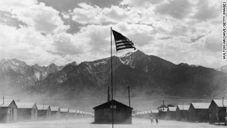 A US flag flies at a Japanese-American concentration camp in Manzanar, California, in July 1942.