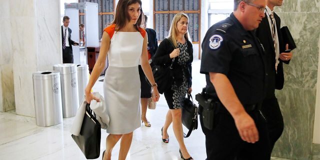Former FBI lawyer Lisa Page, left, arrives for a closed doors interview with the House Judiciary and House Oversight committees, Monday, July 16, 2018, on Capitol Hill in Washington. (AP Photo/Jacquelyn Martin)