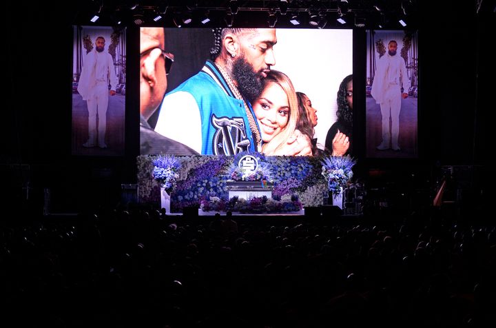 Photos are displayed during Nipsey Hussle's "Celebration of Life" on April 11, 2019, at Staples Center in Los Angeles. Nipsey