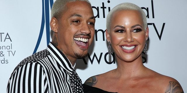 Amber Rose, right, and boyfriend Alexander Edwards attend the National Film and Television Awards Ceremony at Globe Theatre on December 05, 2018 in Los Angeles, Calif. (Photo by Phillip Faraone/Getty Images)