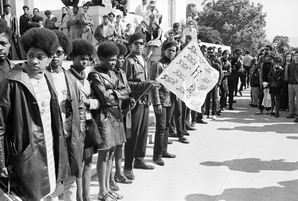 Black Panther Party members and sympathizers gathered outside the courthouse in Oakland during the 1968 trial in which party 