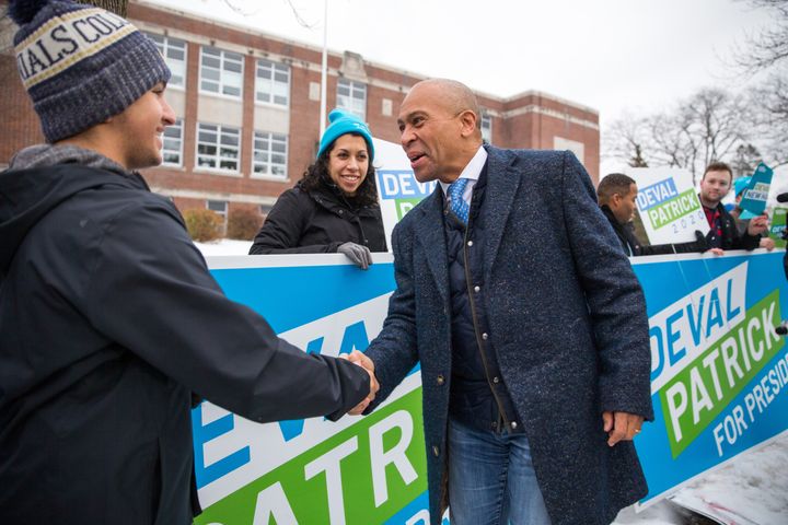 Former Massachusetts Gov. Deval Patrick, shown here shaking hands with voters in Manchester, New Hampshire, as Tuesday's prim