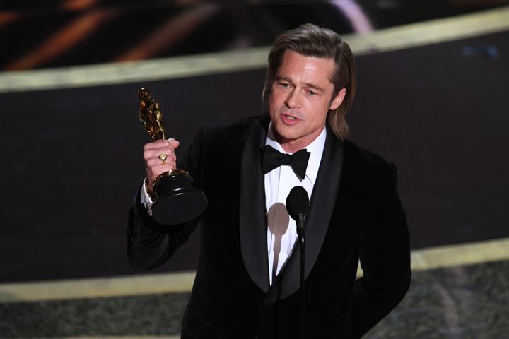 Brad Pitt accepts the Actor in a Supporting Role award for "Once Upon a Time...in Hollywood" onstage during the 92nd Annual A