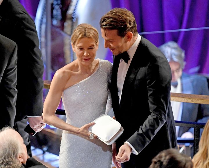 Ren&eacute;e Zellweger and Bradley Cooper pictured together at the 92nd Annual Academy Awards on Feb. 9, 2020.