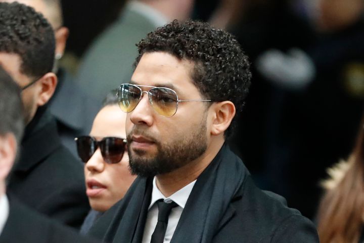 Former "Empire" actor Jussie Smollett, center, arrives for an initial court appearance Monday, Feb. 24, 2020, at the Leighton