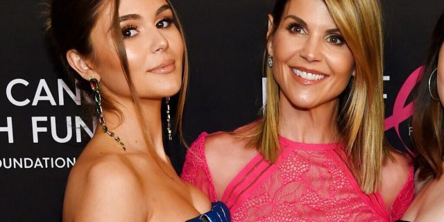 Lori Loughlin poses with her daughter Olivia Jade Giannulli, left, at the 2019 "An Unforgettable Evening" in Beverly Hills, Calif. 