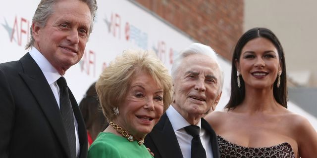 Actors Michael Douglas, Anne Buydens, Kirk Douglas and Catherine Zeta-Jones arrive at AFI Lifetime Achievement Award: A Tribute to Michael Douglas held at Sony Pictures Studios on June 11, 2009.