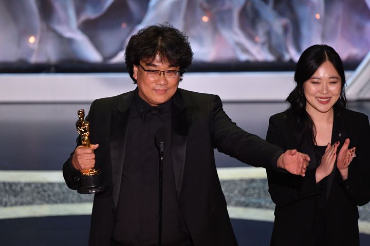 Bong Joon Ho, alongside translator Susan Choi, accepting the award for Best International Feature Film on Feb. 9, 2020.