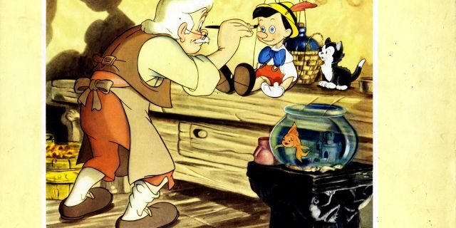 Geppetto paints a wooden puppet. (Photo by LMPC via Getty Images)