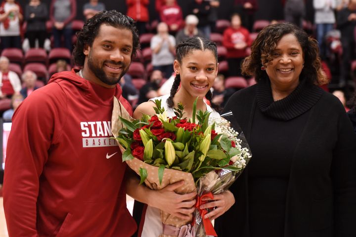 Seattle Seahawks quarterback Russell Wilson joins his younger sister Anna Wilson #3 of the Stanford Cardinal to celebrate Sen