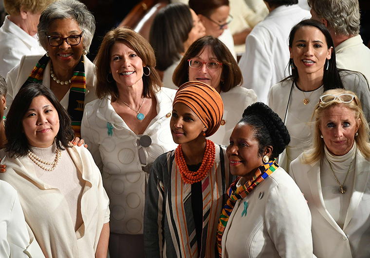 Representative from Minnesota Ilhan Omar and Democratic members from the House of Representatives wearing white attend the State Of The Union address at the US Capitol in Washington, DC, on February 4, 2020. (Photo by MANDEL NGAN / AFP) (Photo by MANDEL NGAN/AFP via Getty Images)
