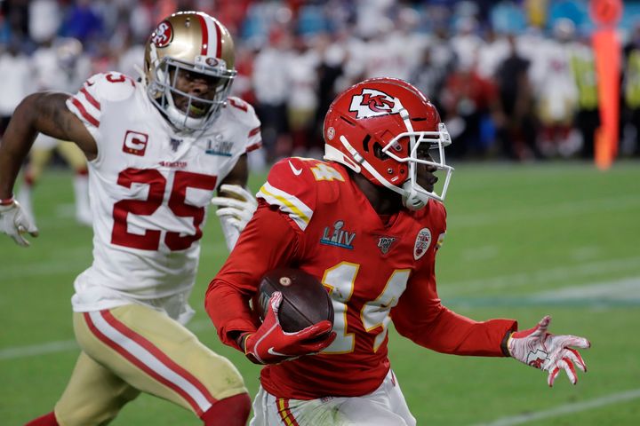Kansas City Chiefs' Sammy Watkins (14) runs in front of San Francisco 49ers' Richard Sherman (25) during the second half of t