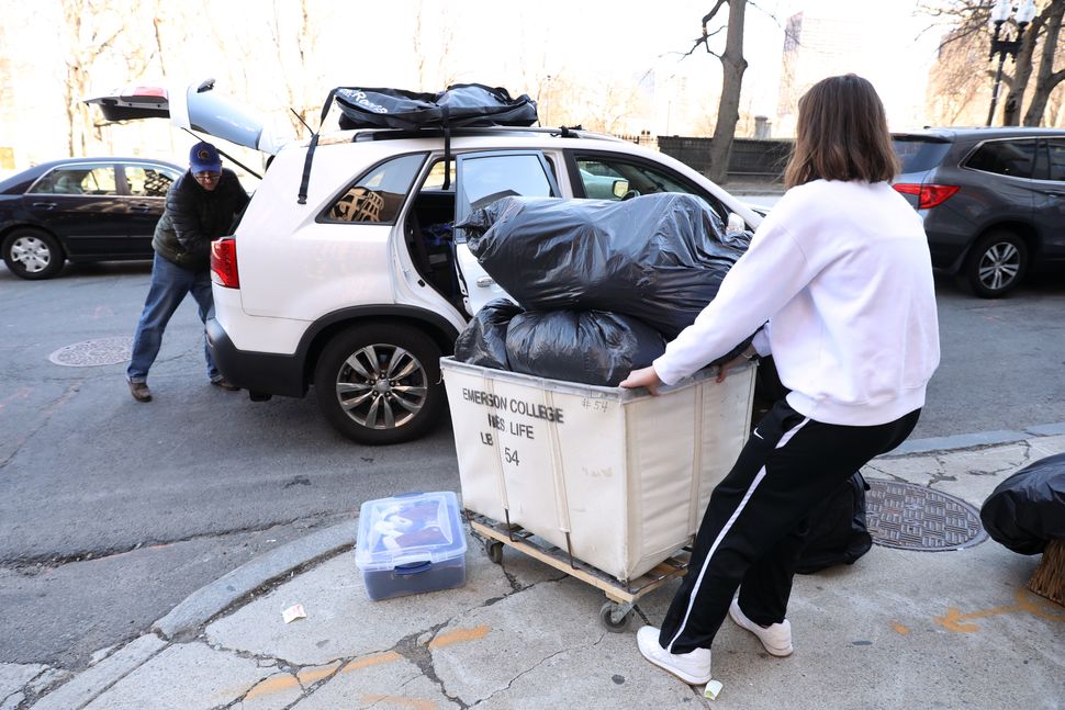 Emerson College student Mallory Shofi moved out of her dorm on Sunday after the Boston school, along with other area universi