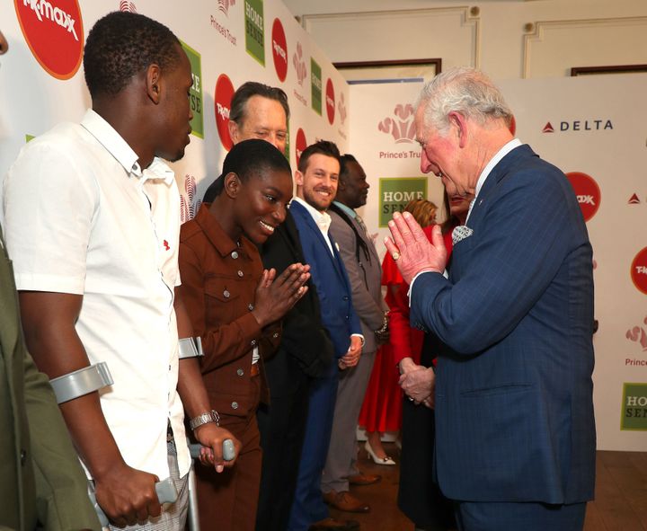 Charles greets Michaela Coel (centre) as he attends the Prince's Trust And TK Maxx &amp; Homesense Awards at London Palladium
