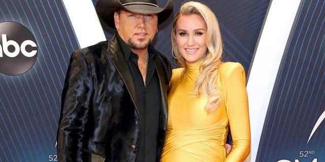 Jason Aldean and wife Brittany Kerr attend the 52nd CMA Awards in 2018.