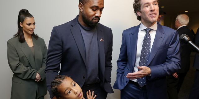 From left, Kim Kardashian West, North West, Kanye West and Joel Osteen answer questions after the 11 a.m. service at Lakewood Church, Sunday, Nov. 17, 2019.