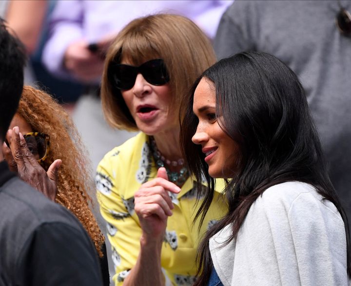 Meghan Markle talks with Anna Wintour before the women's singles final match between Serena Williams and Bianca Andreescu on 