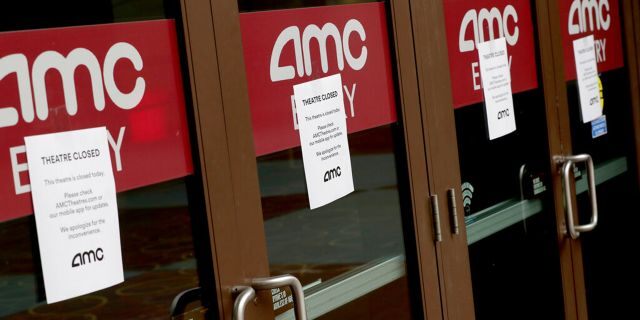 A movie theatre is closed Wednesday, March 18, 2020, in Phoenix. The city of Phoenix issued a state of emergency on Tuesday ordering all bars, gyms and other indoor facilities to close immediately and restaurants to offer to-go service only in an effort to slow the spread of the coronavirus. (AP Photo/Matt York)