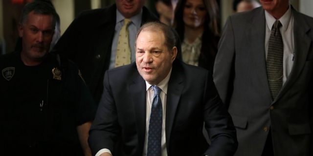 Harvey Weinstein arrives at a Manhattan courthouse for jury deliberations in his rape trial, Monday, Feb. 24, 2020, in New York. Weinstein was convicted Monday of rape and sexual assault against two women and was immediately handcuffed and led off to jail, sealing his dizzying fall from powerful Hollywood studio boss to archvillain of the #MeToo movement. (AP Photo/Seth Wenig)