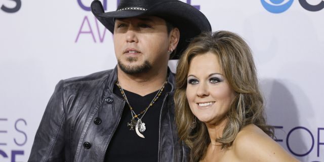 Country music star Jason Aldean and his ex-wife Jessica Ussery arrive at the 2013 People's Choice Awards in Los Angeles, January 9, 2013.