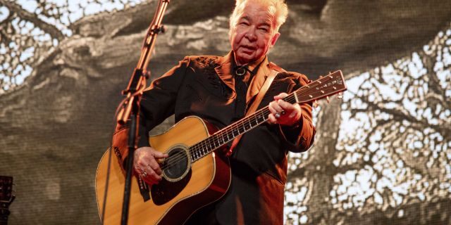 This June 15, 2019 file photo shows John Prine performing at the Bonnaroo Music and Arts Festival in Manchester, Tenn. 