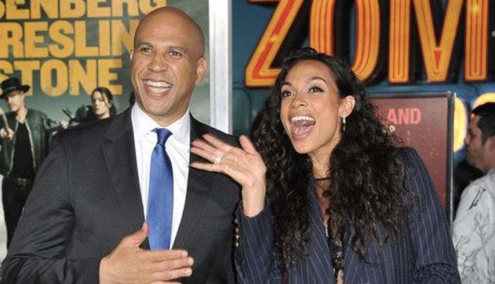 Cory Booker and Rosario Dawson, all smiles at a premiere for Dawson's movie "Zombieland: Double Tap."&nbsp;&nbsp;