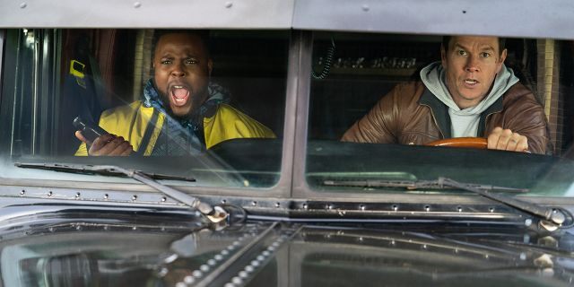 Mark Wahlberg, right, and Winston Duke appear in a scene from 'Spenser Confidential.'