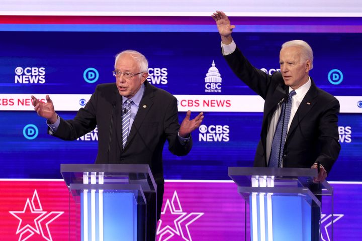 Sen. Bernie Sanders and former Vice President Joe Biden both have something to say during a presidential primary debate in Ch