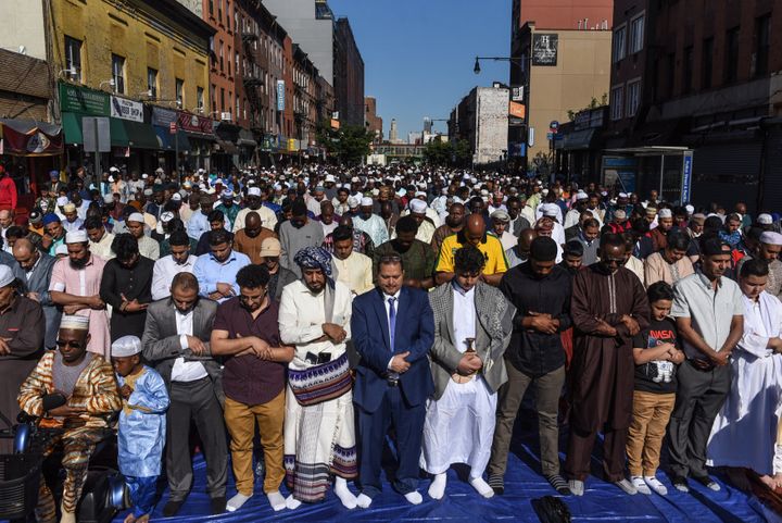 People pray outside a mosque to mark the end of the Muslim holy month of Ramadan in Brooklyn, New York, on June 4, 2019.