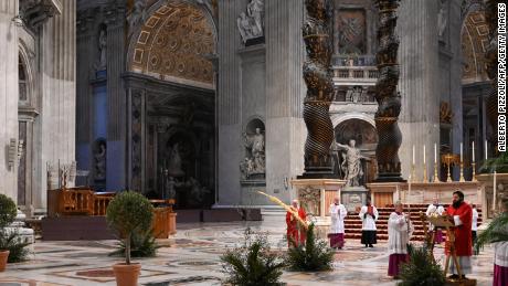 Pope Francis celebrates Palm Sunday mass in an empty church
