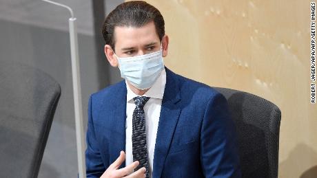Austria&#39;s Chancellor Sebastian Kurz wears a protective mask as he arrives for a special session of the National Council on April 3 in Vienna.