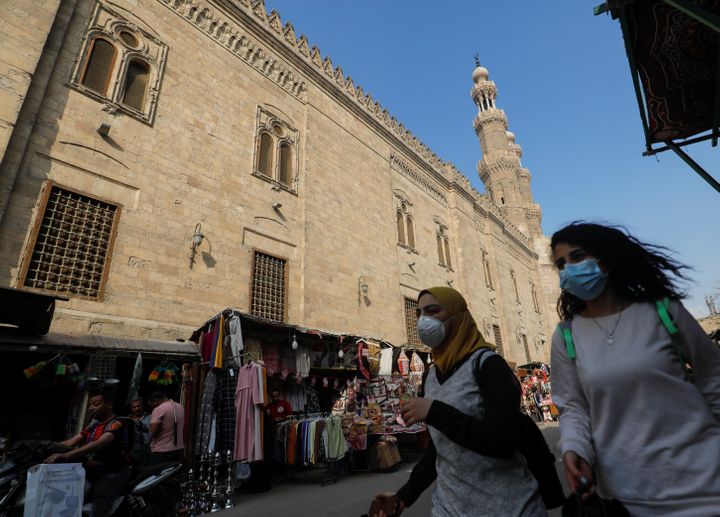 Women wear face masks while walking in Cairo, Egypt, on April 16, 2020, ahead of the Muslim holy month of Ramadan.&nbsp;