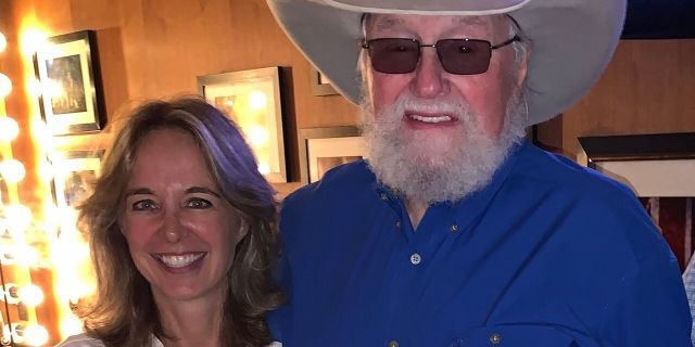 Charlie Daniels, right, is seen with Code of Vets founder and former US Air Force servicewoman Gretchen Smith.