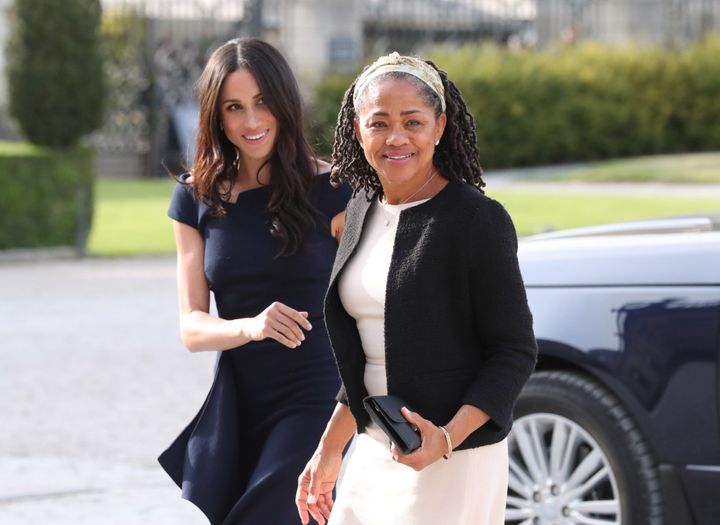 Meghan Markle and her mother, Doria Ragland, arrive at the Cliveden House Hotel in England the day before her wedding to Prin