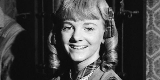 Alison Arngrim as Nellie Oleson.