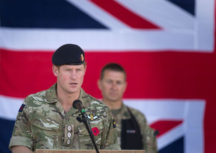 Prince Harry speaks at a Remembrance Sunday service at Kandahar Airfield Nov. 9, 2014, in Kandahar, Afghanistan. Harry served