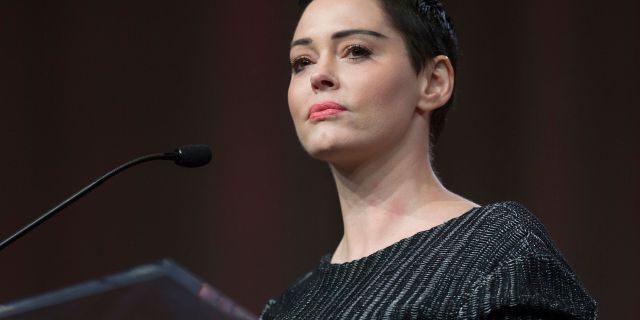 US actress Rose McGowan gives opening remarks to the audience at the Women's March / Women's Convention in Detroit, Michigan, on October 27, 2017. A stream of actress including Rose McGowan, models and ex-employees have come out, many anonymously, to accuse Hollywood producer Harvey Weinstein of sexual harassment and abuse dating as far back as the 1990s. / AFP PHOTO / RENA LAVERTY (Photo credit should read RENA LAVERTY/AFP/Getty Images)