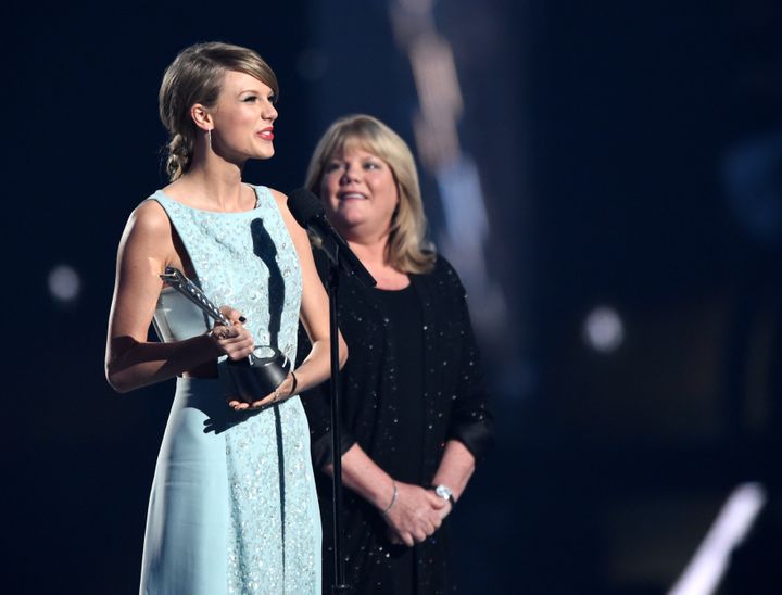 Taylor Swift and her mother Andrea Swift onstage during the 50th Academy Of Country Music Awards.