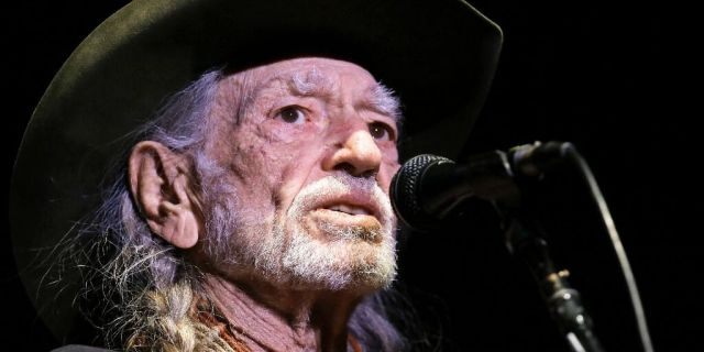 Willie Nelson took gifted face masks and turned them into a charitable endeavor. 